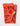 Red tomato patterned towel with a wooden spoon on a white background