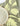 Ceramic bowl on a fabric surface with artichoke pattern