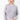 A woman wearing a light lavender ribbed knit sweater and dark brown pants, standing against a plain white studio background.
