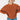 A woman wearing a chunky orange ribbed knit sweater and blue jeans, posing against a plain white background.
