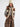 Handknit vest with horse motif and faux fur lining worn over a grey turtleneck paired with brown plaid pants on white background.