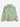A colorful patterned quilted jacket on a white background. 