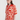 Woman wearing a red and white patterned shirt on a white background