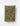 Tea towel with olive leaf pattern hanging on a line against a white background