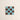 Square tile with a grid pattern of blue and brown squares on a beige background