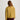 Person wearing a mustard yellow quilted jacket on a white background