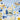 A colorful table setting with a in of lip balm, daisies and a champagne glass on a blue and white checkered cloth