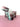 Purple and mint colored tumblers on a pink surface with a white background